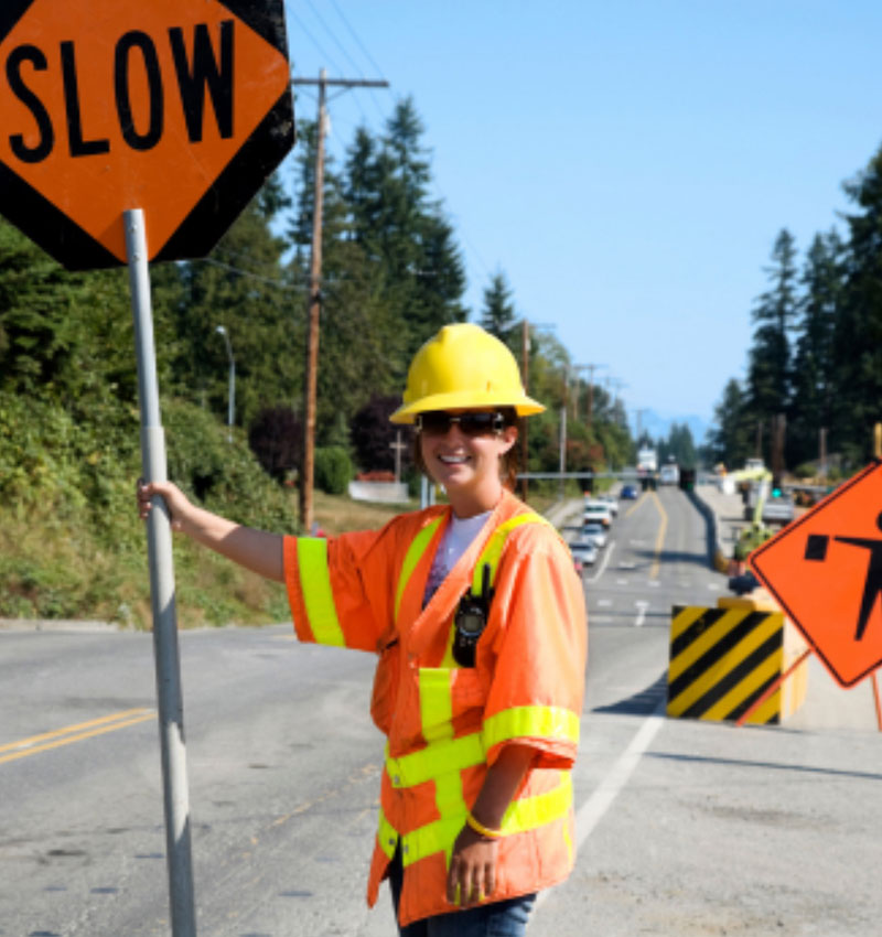 Person Holding Slow Sign Person Holding Slow Sign